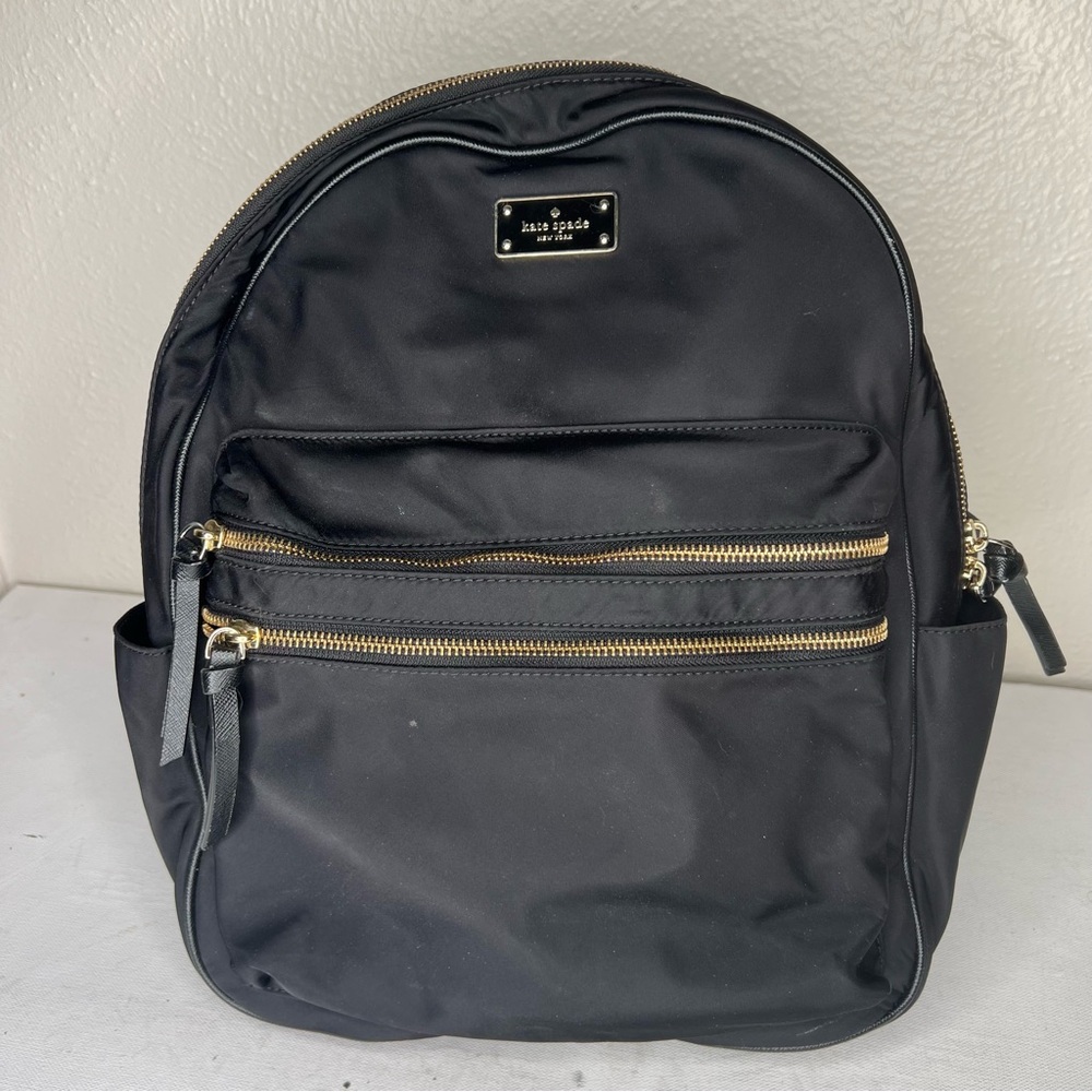 Kate Spade black gold zippers back pack